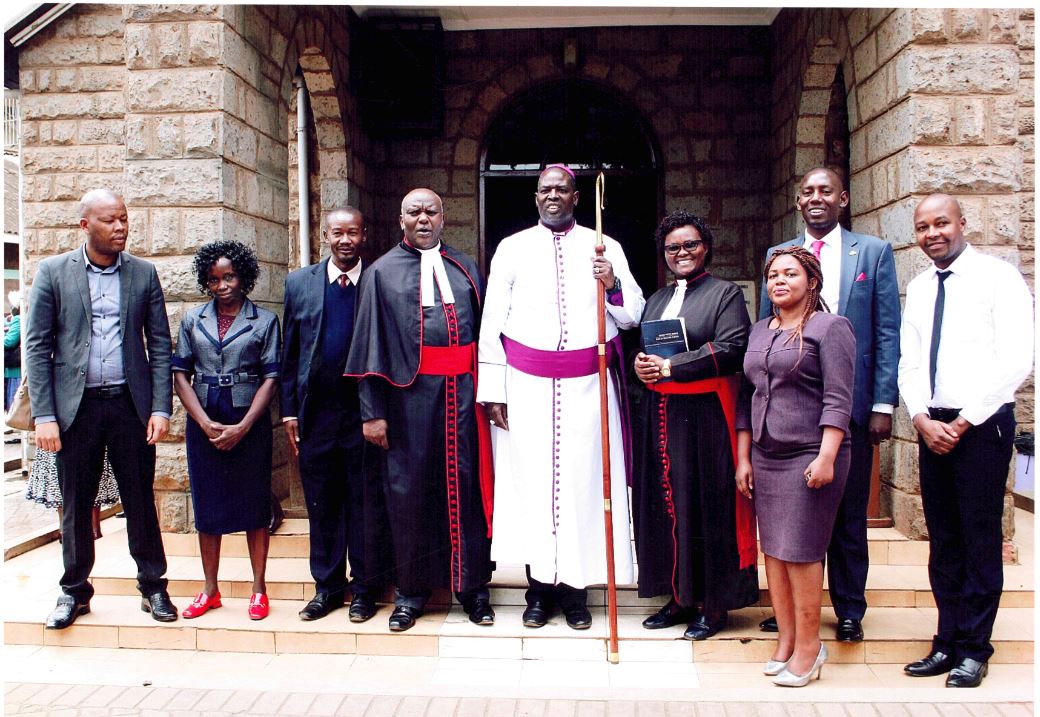 The Ukristo na Ufanisi wa Anglican Sacco Board members, CEO and the Sacco Senior Accountant with the Anglican Archbishop Jackson Nasoore Ole Sapit at the ACK Emmanuel Church.